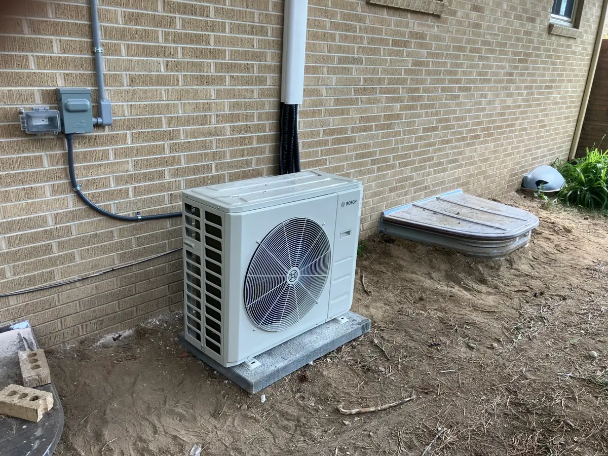 Bosch outdoor mini-split unit professionally installed on concrete pad