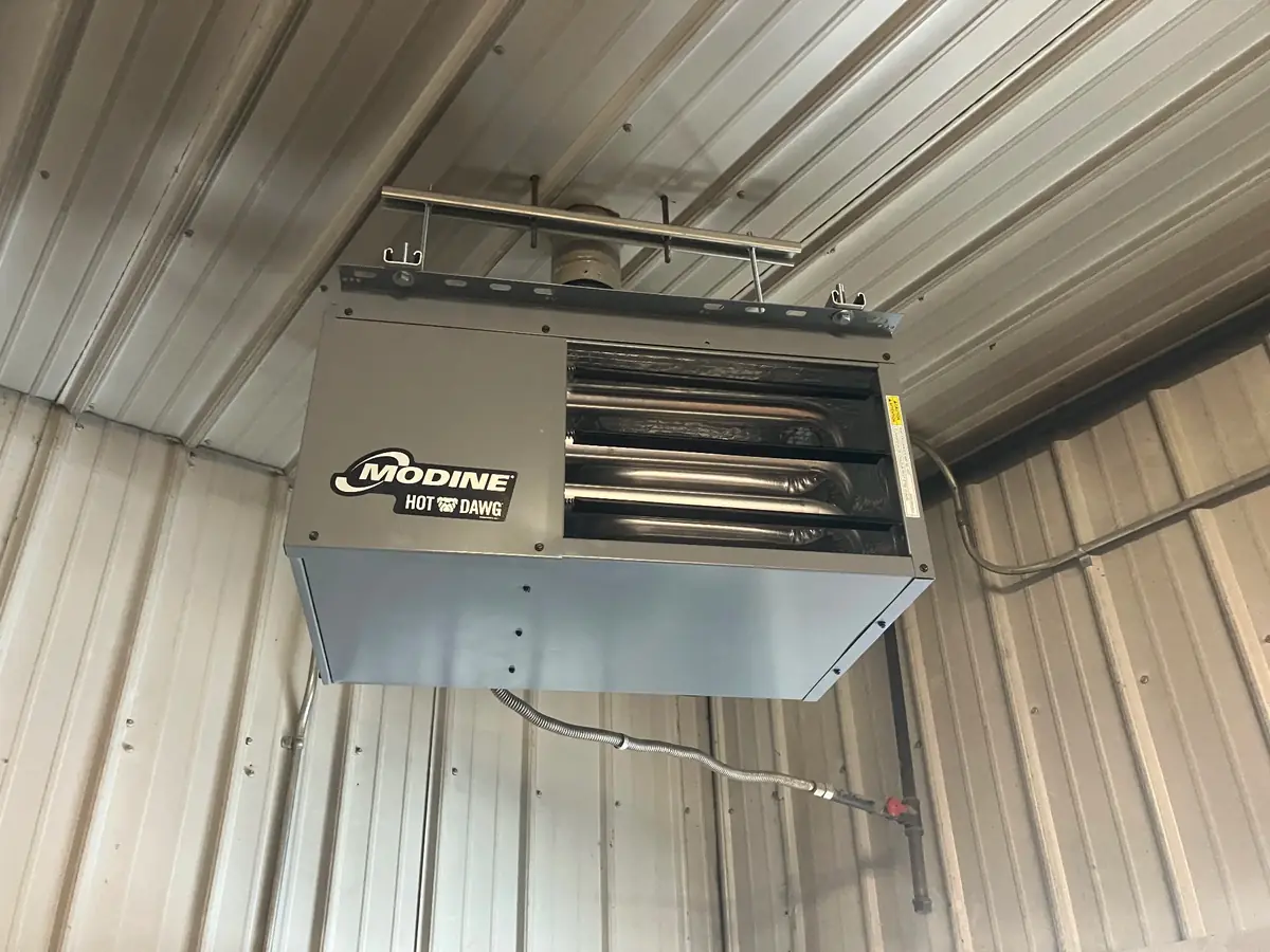Commercial Heating Repair Greeley CO - Unit Heaters & Furnaces Modine unit heater installation and repair service in commercial garage by East to West Heating and Air Conditioning